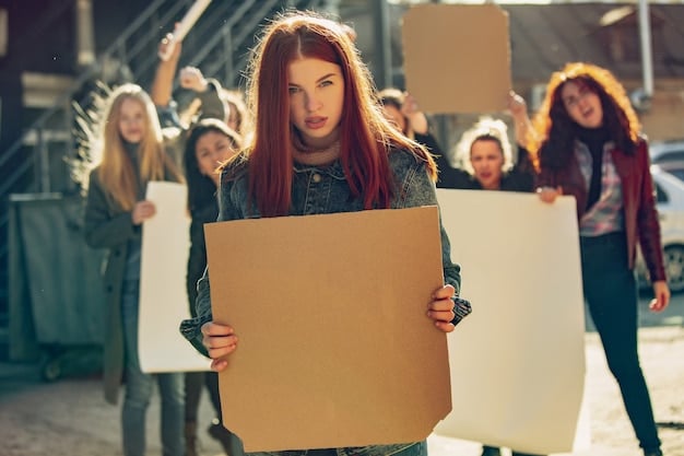 A group of people protesting in support of abortion rights, holding signs and chanting slogans outside a government building.