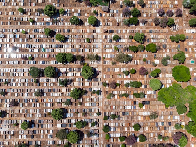 aerial view of a diverse urban neighborhood featuring a mix of housing types, including apartment buildings, townhouses, and single-family homes, demonstrating the impact of flexible zoning.