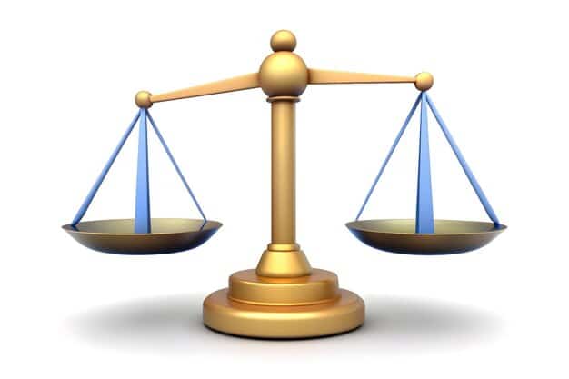 A graphic illustration showing a balance scale with 