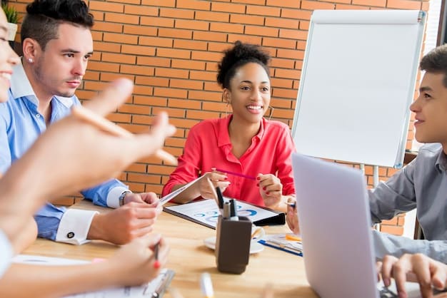 An image showing a diverse group of people participating in a skills training workshop, working with computers and tools, highlighting the importance of skills training in bridging the income inequality gap.