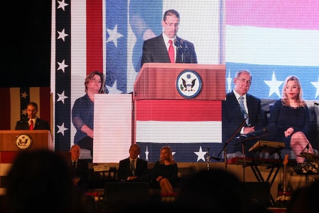 An image depicting a split screen. On one side, a group of Republican senators are seen engaged in a discussion. On the other side, Democratic senators are seen in a similar setting. The image represents bipartisan negotiations and political divides within the US Congress.