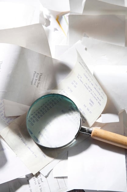 A magnifying glass hovering over a document that appears to be a financial disclosure form, illustrating scrutiny and investigation.