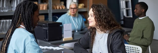 A classroom scene showing diverse students of various ages engaged in a job training program, highlighting the opportunity for individuals to acquire new skills and improve their economic prospects.